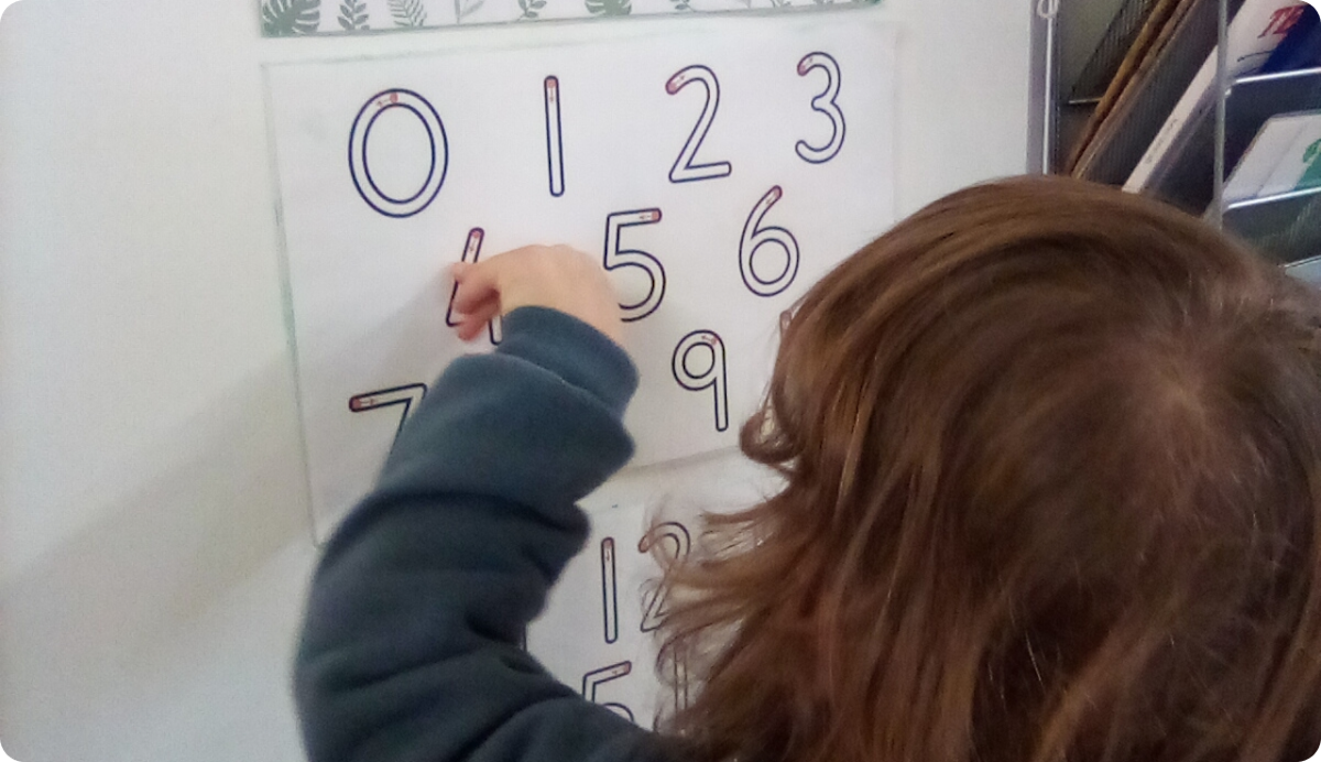 A child learning numbers